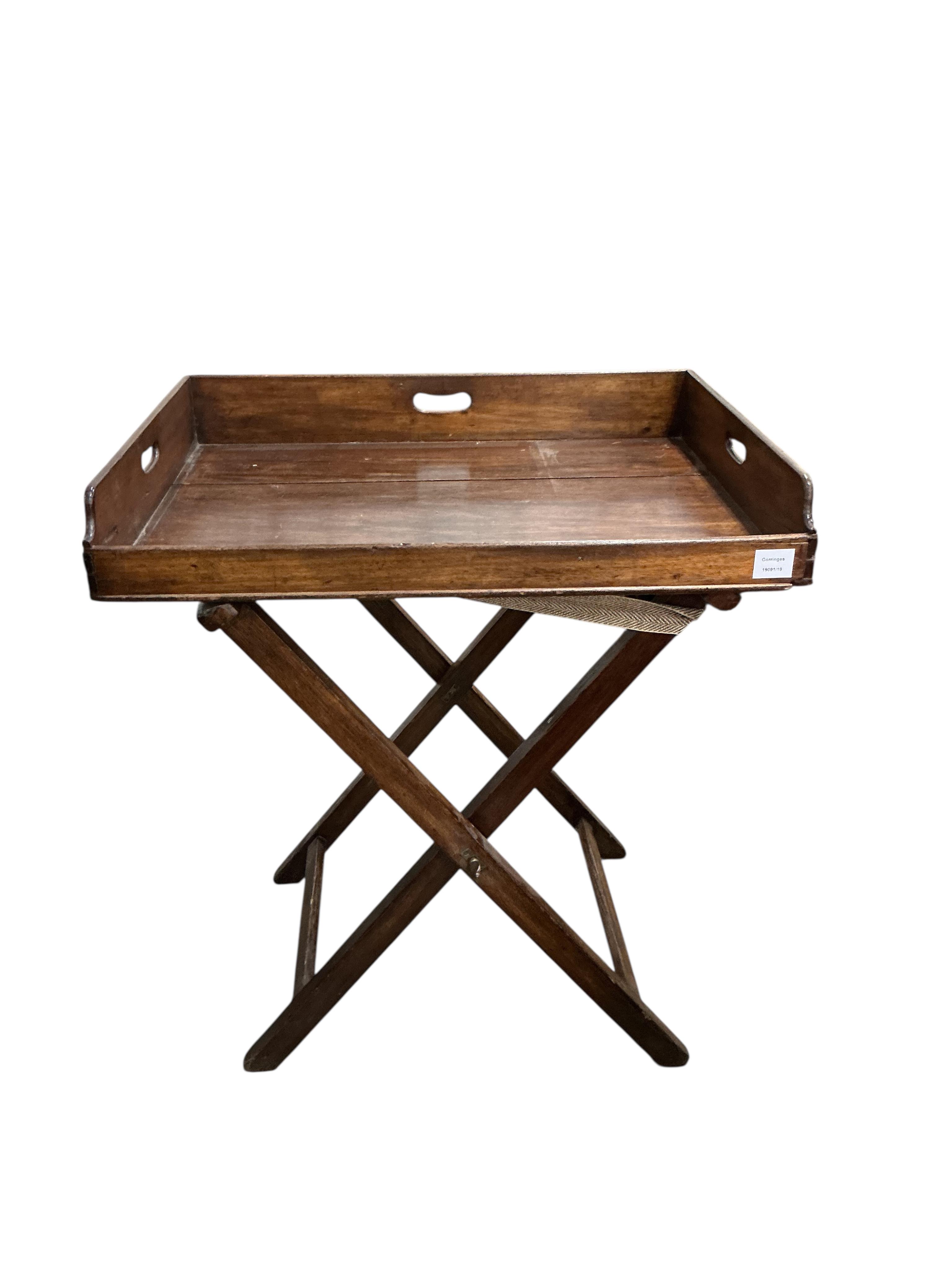 A Victorian rectangular mahogany butler’s tray on folding stand, width 74cm, depth 56cm, height 84cm